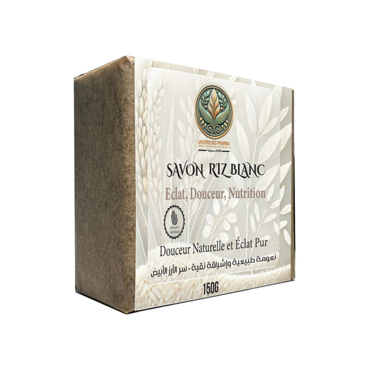 Savon au riz blanc naturel et artisanal, hydratant et matifiant, enrichi en poudre de riz pour un teint éclatant.